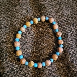 Women's bracelet tan and turquoise.